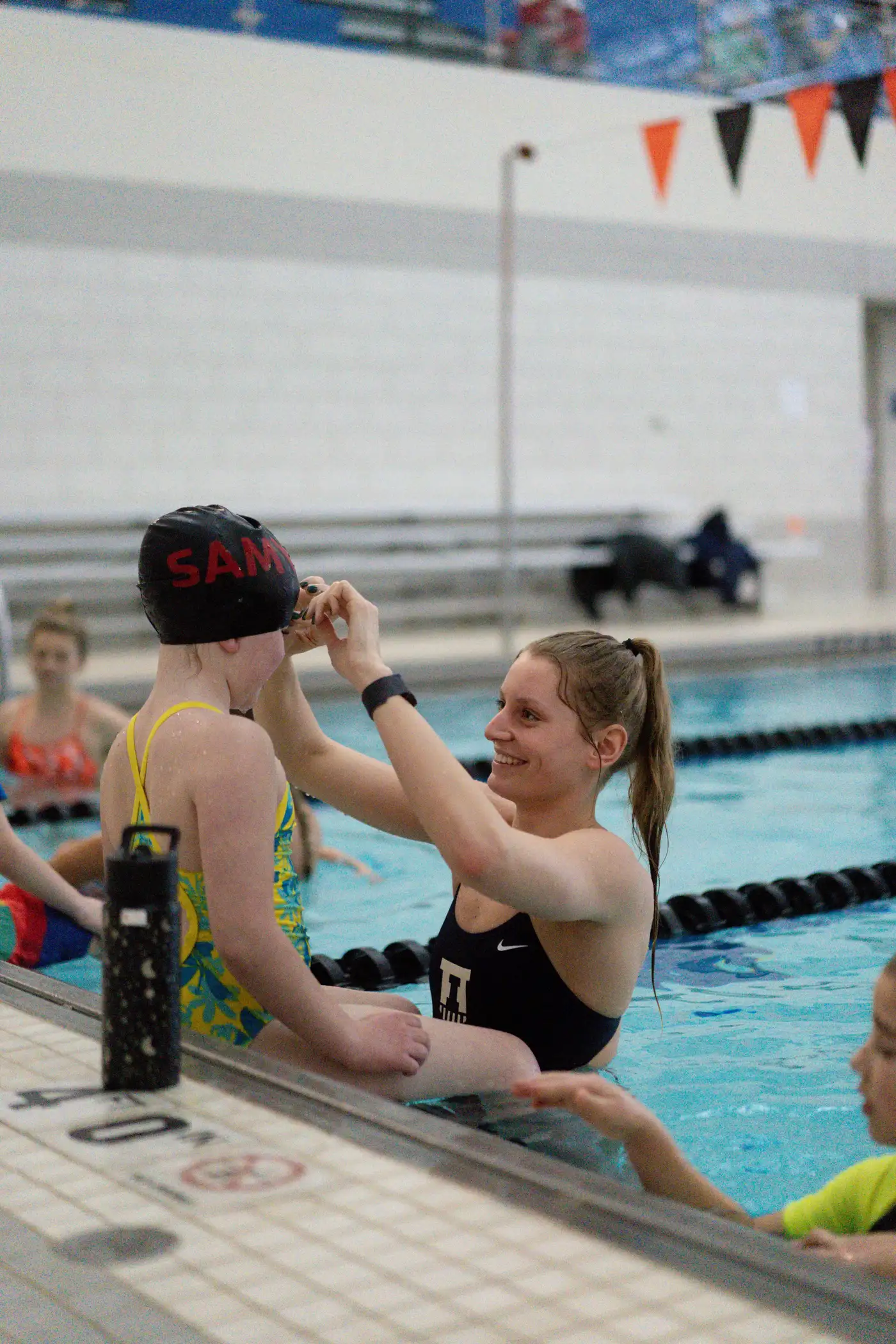 Illinois swimmer helping with swim cap