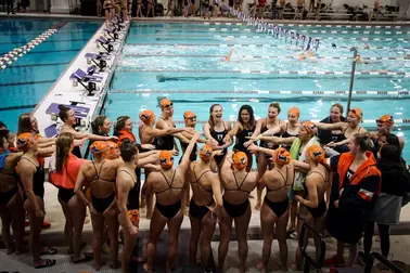 Illinois Swimming team huddle